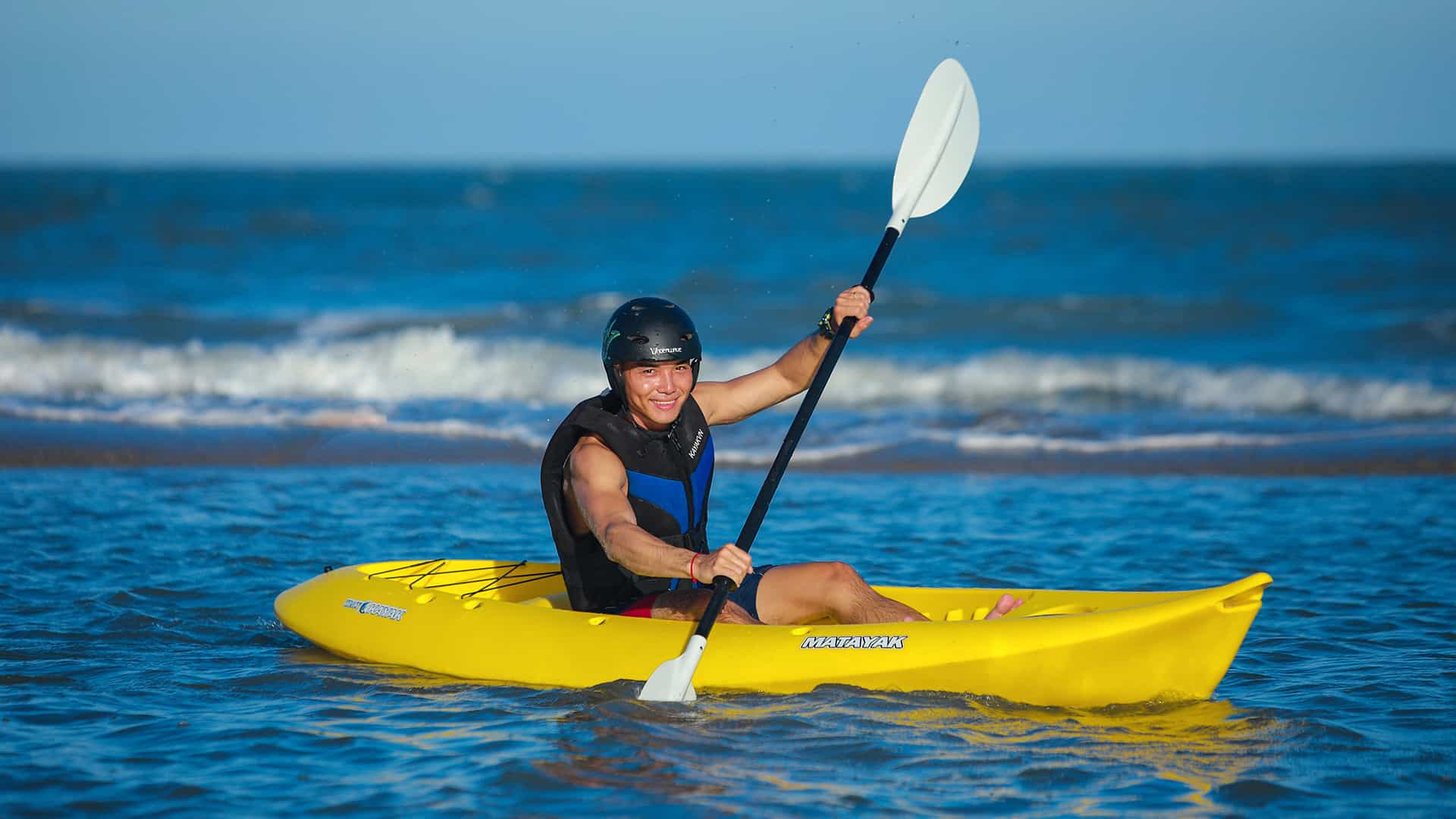 Guests participating in water sports activities at The Grand Ho Tram Budget-Friendly Hotels in Saigon